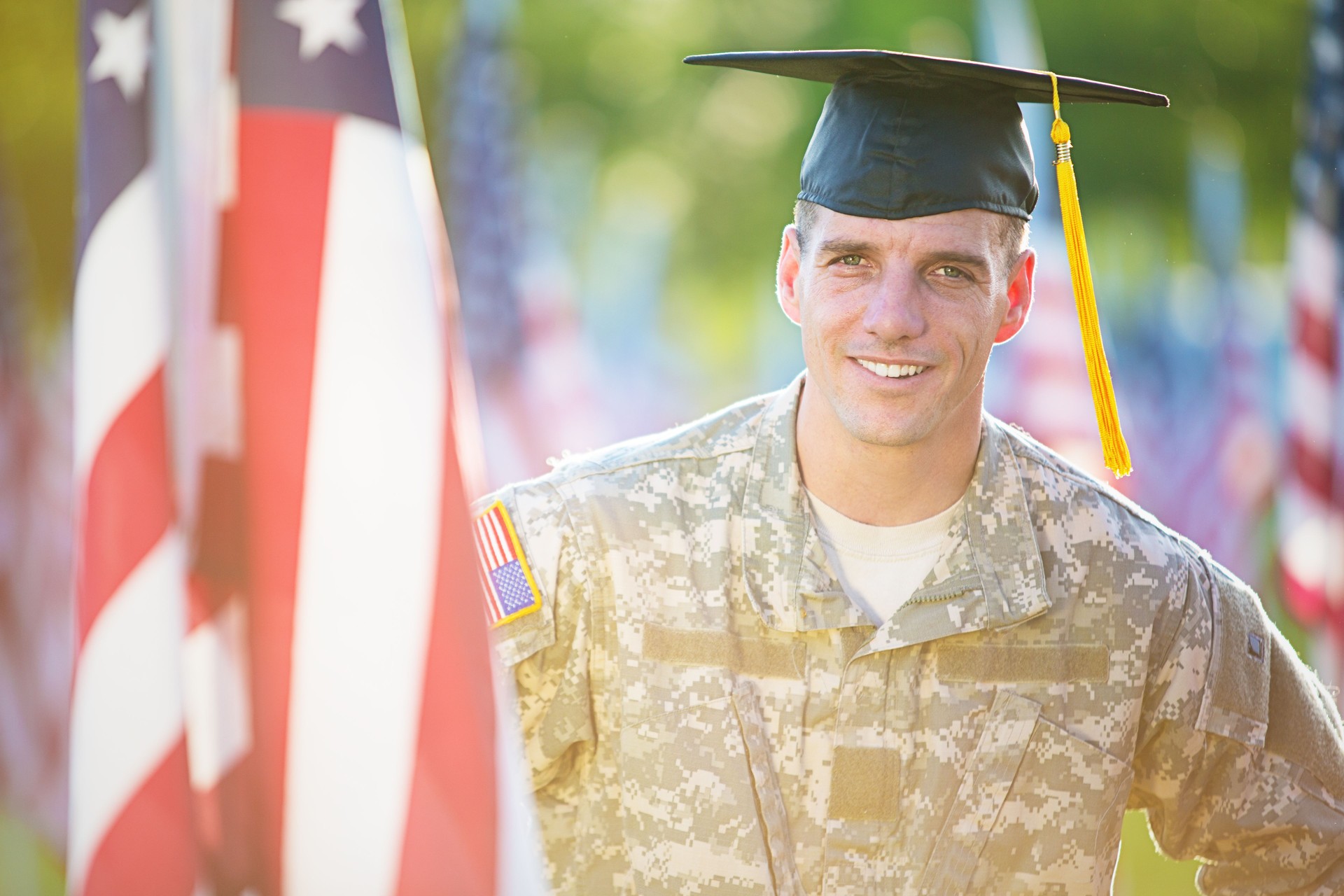 American Soldier with graduation hat